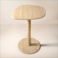 a small wooden table with a round base