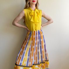 A Bright And Cheerful 70s Maxi Dress! Buttons Up The Front. Interior Skirt Button. Top Is Not Lined. Skirt Is Lined In A Soft White Fabric Underlay. Skirt's Novelty Print Features A Floral Pattern In Yellow, Orange, Purple, And Black Colors. Abstract Pattern Design. Please Note: There Are Small Faint Marks On The Left Tie, But Overall Does Not Affect The Wearability Of The Garment. Please Check Photos Provided. No Label. No Stretch. Fabric Content Is Cotton. Dress Is In Excellent Condition. Freshly Cleaned And Ready To Wear! Measurements Bust: 36 Inches Waist: 28 Inches Hips: 38 Inches Length: 57 Inches Shoulder: 15 Inches Would Best Fit A Small Up To A Medium. Model's Measurements Bust: 70s Maxi Dress, Abstract Pattern Design, Dress Buttons, Lined Skirt, Button Top, Novelty Print, Vintage Yellow, White Fabric, Soft White