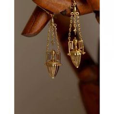 "Embrace timeless elegance with our stunning gold-plated earrings inspired by Greek and Roman artistry. These exquisite pieces feature hanging gold balls reminiscent of elongated forms found in Art Deco and a touch of the intricate patterns seen in Hurufiyya art. Channel the grandeur of Anglo Gothic design and adorn yourself with a touch of history. ✨ Real 22k gold multiple layers plated. Anti tarnish, Waterproof, Water resistance Luxury Gold Plated Ceremonial Jewelry, Luxury Traditional Baroque Earrings, Engraving Rings, One Thousand And One Nights, Thousand And One Nights, Gold Bottle, Look Boho Chic, Ear Drop, One Thousand