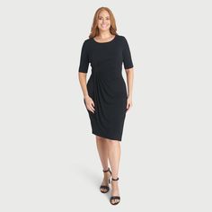 Meet the Lisa Black Faux Wrap Dress – where sophistication meets comfort effortlessly. Slip into style with this chic and versatile dress that combines a classic silhouette with modern convenience. Lisa is more than just a dress; she’s a statement of elegance and ease. Designed with elbow sleeves, Lisa strikes the ideal balance between modesty and contemporary flair. Her faux wrap design adds a touch of sophistication, making her perfect for various occasions, whether it's a day at the office or White Shrug, Lisa Black, Black Floral Print Dress, Black Shrug, Black Tie Wedding Guests, Celebrate Mom, Versatile Dresses, Floor Length Dresses, Black Wrap Dress