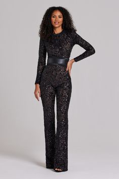 Bella Black Dark Nude Jumpsuit Women's Clothing > Jumpsuits. DESCRIPTION & FEATURES  Inspired by Parisian style, our BELLA jumpsuit takes a modern twist on a traditional design. The dark nude lining provides coverage, whilst accentuating the intricate sequin embellished lace detailing. This style looks equally as good paired with or without the leather corset belt. -Sequin embellished lace. -Dark nude lining.  -Concealed zip fastening.   -Functional detachable belt included      SIZE & FIT INFOR Jumpsuit Night Outfit, Hen Outfit, Nadine Merabi, Black Lace Jumpsuit, Leather Corset Belt, Glam Outfit, Sequin Jumpsuit, Hacks Clothes, Lace Jumpsuit