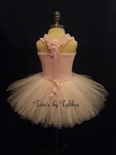 "This adorable piggy tutu dress is perfect for a theme birthday party, Halloween costume or just for fun! This tutu dress is made with a light pink stretch crochet top embellished with piggy eyes and nose then I add layers of fluffy pink tulle with glitter tulle mixed throughout - just to add some sparkle, a removable pink felt pig tail and topped off with pink ruffle straps that tie around the neck and a black satin bow. When ordering select the child's clothing size or send measurements* in No Cute Pink Tutu Dress For Costume Party, Pink Fitted Tutu Dress For Costume Party, Pink Stretch Tulle Tutu Dress, Cute Fitted Tutu Dress For Parties, Whimsical Fitted Tutu Dress For Birthday, Pink Fitted Ballet Tutu Dress, Pink Fitted Tutu Dress For Birthday, Piggy Costume, Pig Halloween Costume