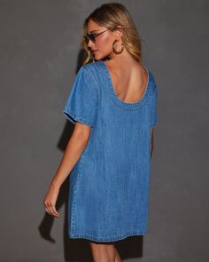 As summer winds down, the Effortless Vibe Denim Shift Dress is here to ensure your style can be one thing that still shines. Crafted from structured denim fabric, this dress combines laid-back charm with refined elegance. The pull-on styling and side slant pockets offer easy-going convenience, while the sleek shift silhouette keeps you looking effortlessly chic. Perfect for those final summer outings or transitioning into fall, this dress is your go-to for a relaxed, yet polished look. Structure Denim Fall Dress, Fall Denim Dress, Denim Dress Fall, Jean Shirt Dress, Tencel Dress, Western Wear Dresses, Black Friday Shopping, Dresses By Length, Wrap Sweater