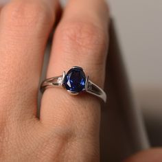 This ring features a 6*8mm oval cut lab sapphire and sterling silver finished with rhodium. Customization is available. It is made by hand, and it will take about 7 days to finish the ring after your payment is completed. Any question, just let me know. :) My shop homepage: https://www.etsy.com/shop/LuoJewelry?ref=l2-shopheader-name Sapphire Ring Silver, Sapphire Solitaire Engagement Ring, September Birthstone Ring, Oval Sapphire Ring, Sapphire Birthstone, September Birthstone Rings, Sapphire Solitaire, Blue Sapphire Ring, Gold Ring Stack