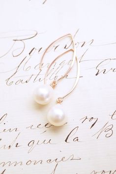 Long Rose Gold Freshwater Pearl Drop Earrings, No. RGHE024 :*About This Piece*: ♦︎ High quality, lustrous cream freshwater pearl drops are hung on long rose gold vermeil earrings. These earrings are elegant and classy with a timeless appeal. ♦︎ Length - 1.7 in (42 mm) ♦︎ Width - .47 in (12 mm) by .4 in (10mm) ♦︎ All items from my shop are packaged in padded cardboard jewelry boxes. Custom gifting options available upon request. ♦︎ Visit my shop for more here: https://www.etsy.com/shop/storygirlc Elegant Rose Gold Pearl Earrings For Gift, Elegant Rose Gold Pearl Earrings As Gift, Classic Rose Gold Pearl Earrings For Parties, Classic Rose Gold Jewelry With Pearl Drop, Classic Rose Gold Hypoallergenic Pearl Earrings, Feminine Rose Gold Pearl Earrings Gift, Delicate Hypoallergenic Rose Gold Pearl Earrings, Classic Hypoallergenic Rose Gold Pearl Earrings, Hypoallergenic Rose Gold Pearl Earrings