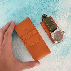 "This beautiful handmade leather watch case is made from veg-tanned calfskin leather. It fully protects your watches from scratches and impacts due to the resilience of this particular leather and its solid structure. The leather piece inside the watch pouch keeps your watch from moving. Keeping your watches in your luggage without protection might lead to disaster! This small and compact watch pouch would be perfect for your travels.  It is such a small and compact watch case that you can even Timeless Leather Case With Included Case, Rectangular Leather Watch Accessories For Everyday Use, Leather Watch Accessories For Everyday Use, Timeless Leather Watch Accessories With Case, Everyday Round Case Watch With Leather Strap, Leather Watch Accessories With Case, Rectangular, Rectangular Leather Watch Bands As Gift, Rectangular Leather Watch Bands For Everyday Use, Brown Leather Watch Accessories With Round Case