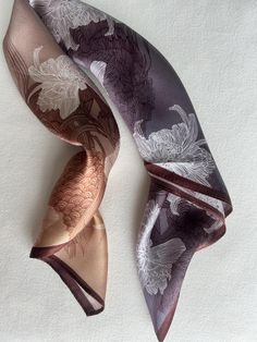 Elegant Chrysanthemum & Lucky Koi print gradient color natural mulberry silk small square scarf with size of 53 cm x 53 cm / 20.8 in x 20.8 in. A soft old-mauve gradient glides across the scarf, with oriental carp and chrysanthemum line art. An elegant and refined scarf, with a bit of a mysterious feel - complemented by an exquisite gleam across the print. Smooth and lustrous silk charmeuse, soft and gradient colors, one sided quality print, fabric breathable and skin-friendly feels very comfort Luxury Tussar Silk Dupatta Silk Scarf, Luxury Handmade Silk Scarf As Gift, Brown Square Silk Scarf Gift, Chrysanthemum Line Art, Silk Hair Scarf, Small Neck Scarves, Small Silk Scarf, Bag Scarf, Silk Scarf Hair