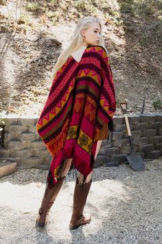 Looking for a stylish and unique poncho that will make you stand out from the rest? Look no further than the Aztec Inspired Go West Ruana! This one-of-a-kind ruana is perfect for those chilly days or nights when you want to add a little extra warmth and style. The bold and eye-catching Aztec print is sure to turn heads, while the warm and cozy fabric will keep you comfortable all day long. Whether you're headed to the office or out on the town, this ruana is a must-have fashion statement piece t Chic Outerwear, Casual Bodysuit, Go West, Bachelorette Dress, Rush Dresses, Cozy Fabric, Bridal Shower Dress, Bohemian Beach, Jumpsuit Shorts Rompers