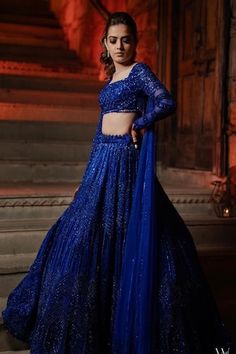 Blue attached can-can lehenga with sequin, crystals and cutdana embroidery. Paired with matching heavy embroidered blouse with draped one shoulder dupatta. - Aza Fashions Royal Blue Fitted Choli For Party, Royal Blue Fitted Party Choli, Royal Blue Fitted Lehenga For Party, Fitted Bollywood Lehenga In Royal Blue, Fitted Royal Blue Bollywood Lehenga, Blue Floor-length Lehenga With Unstitched Blouse, Blue Lehenga With Unstitched Blouse Floor-length, Blue Dress With Sheer Dupatta For Reception, Royal Fitted Traditional Wear With Pallu