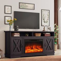 an entertainment center with a fireplace in the middle