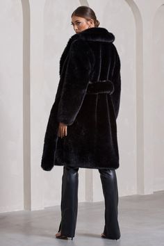 Chic Solid Faux Fur Outerwear, Chic Fur Coat With Faux Fur Trim, Solid Color Faux Fur Long Coat, Chic Long Faux Fur Coat, Solid Color Long Faux Fur Coat, Chic Black Fur Coat With Faux Fur Trim, Black Long Faux Fur Coat, Chic Faux Fur Coat For Work, Black Faux Fur Coat For Work