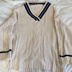 100% Polyster Almond V Neck Sweater. Hand Wash. New Condition, Only Worn Once. Bust 50.4, Total Length: 27.2, Shoulder Width: 18.1, Sleeve Length: 26.8 Oversized Cozy Cable Knit V-neck Sweater, Oversized Cotton Cable Knit Sweater, Cozy Cotton V-neck Sweater, Contrast Trim, V Neck Sweater, Vneck Sweater, Neck Sweater, Knit Sweater, Knitted Sweaters