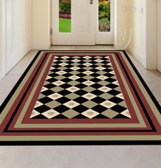 a black and white checkered area rug in front of a door with an open window