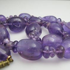 "For sale: (1) d950 Amethyst Necklace PLEASE READ ENTIRE DESCRIPTION BEFORE PURCHASING Pre-owned item. Good condition. Please see pictures for details. Sold as is, as seen on pictures. This necklace is stamped. Specifics: Screw clasp Length: 23.5 inches Width: 17 mm Total Weight: 124.5 grams Please be 100% sure of your purchase before buying, as we do not offer refunds. We are more than happy to provide any specific pictures, or answer any questions you have regarding our items. All jewelry is c Formal Purple Amethyst Necklace, Classic Hallmarked Amethyst Necklace, Classic Amethyst Purple Necklace, Classic Purple Amethyst Necklace, Formal Amethyst Gemstone Bead Necklace, Collectible Amethyst Purple Necklace, Collectible Amethyst Necklace In Purple, Collectible Purple Amethyst Necklace, Purple Amethyst Necklace For Collectors