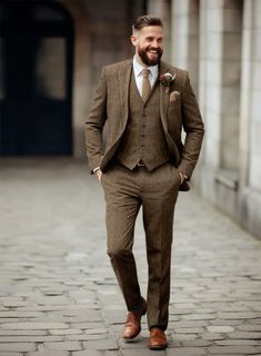 a man in a suit and tie walking down the street