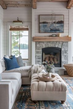 a living room filled with furniture and a fire place in front of a stone fireplace