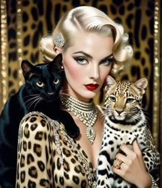 a woman holding a black cat and a leopard on her lap, in front of a gold background