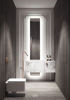 a bathroom with marble walls and flooring next to a bathtub in the middle