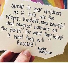 someone holding up a piece of paper with a poem on it that says speak to your children as if they are the wise