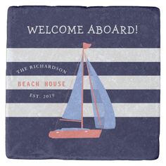 a coaster with a sailboat on it that says welcome aboard the richardson beach house