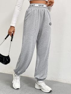 F00215614-103 Solid Color Athleisure Sports Pants, Solid Moisture-wicking Sportswear Pants, Baggy Wide-leg Sports Pants, Sporty Wide Leg Spring Joggers, Solid Color Sportswear Gym Bottoms, Cotton Gym Pants, Sporty Pants For Spring Sports, Sporty Pants For Sports In Spring, Gray High Waist Sports Bottoms