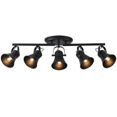 an overhead track light fixture with five lights on each side and four bulbs in the middle