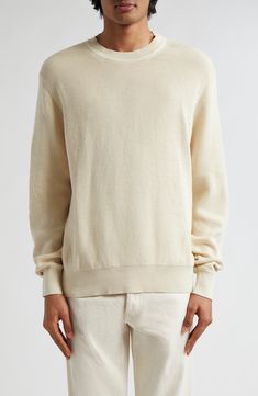 A finely knit waffle stitch brings light texture and elevated comfort to this season-spanning cotton sweater that's versatile and layer-friendly. 27" length (size Medium) Crewneck Long sleeves Ribbed cuffs and hem 100% cotton Machine wash, dry flat Made in Portugal Designer Clothing Spring Waffle Knit Sweater For Everyday, Neutral Crew Neck Sweater With Textured Knit, Cream Cotton Ribbed Sweater, Cream Ribbed Cotton Sweater, Beige Waffle Knit Sweater For Spring, Everyday Cotton Waffle Knit Sweater, Cream Cotton Sweater For Layering, Textured Crew Neck Spring Sweater, Relaxed Fit Waffle Knit Sweater