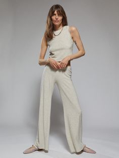 Perfectly proportioned, the relaxed fit of the Zephyra Flare offers a sense of soulful Gypset style for wanderers and adventurers alike. Finished with a wide leg flourish, the sensuous high waist and exaggerated ankle detailing are crafted for summer in lush terry toweling to offer a sense of 70s laid-back langour. Beige Wide Leg Pants For Loungewear, Beige Full Length Wide Leg Pants For Loungewear, Relaxed Wide Leg Beige Pants, Relaxed Beige Wide Leg Pants, Neutral Wide Leg Bottoms For Loungewear, Chic Neutral Wide Leg Loungewear Pants, Chic Neutral Wide Leg Pants For Loungewear, Neutral Wide-leg Loungewear Pants, Long Sleeve French Terry Top With Ribbed Waistband