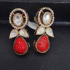 These coral and polki diamonds in stud earrings creates a harmonious blend of traditional elegance and contemporary style. Material : 925 Hallmarked Silver Stones : Moissanite polki , semi-precious corals, Cubic Zirconia Coral Earrings Gold Indian, Red Coral Jewelry With Natural Stones, Traditional Adjustable Red Coral Jewelry, Coral Earrings Studs, Red Coral Earrings, Coral Stone, Pin Pendant, Stone Studs, Pendant Rings