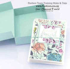 an open box with flowers on it next to a card and envelope that says pocketers team training make & take