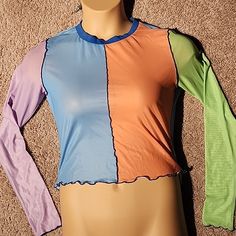 Delia*S Long Sleeve Mesh Top Blue, Green, Orange And Purple Nwot Thanks For Interest In My Closet Bundle 3+ Items For An Automatic 15% Discount Trendy Green Top With Contrast Color, Green Tops For Spring, Multicolor Crew Neck Top With Splicing, Trendy Green Top With Splicing Detail, Multicolor Spliced Crew Neck Top, Trendy Green Spliced Top, Casual Blue Tops With Splicing, Casual Blue Tops With Splicing Details, Blue Stretch Tops With Patchwork