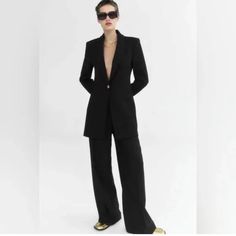 If You Have This One Blazer From Zara, You Can Get Rid Of All Your Other Long Black Blazers. It’s Simply Beautiful. Get It Today And Slayquestions? Leave A Comment Below! Elegant Black Blazer Dress For Business Casual, Office Pantsuit With Hidden Button Closure And Long Sleeves, Chic Structured Suit With Button Closure, Chic Button-up Business Suit, Single Button Blazer Dress For Work, Long Sleeve Pantsuit With Button Closure For Business, Chic Long Sleeve Pantsuit For Fall, Tailored Black Structured Blazer Dress, Chic Structured Winter Suits