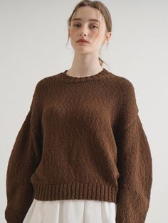 This is a minimal and modern top by VLETI that is made out of high quality and sturdy material. With distinctive mood of the design and comfortable wear, you can style it for your casual daily outfit.- Regular silhouette and round neckline- Boucle fabric with high air permeability- Minimal and feminine mood Oversized Textured Knit Brown Tops, Oversized Brown Textured Knit Top, Modern Brown Tops For Workwear, Modern Brown Top For Work, Oversized Brown Soft Knit Tops, Brown Cotton Sweater For Workwear, Brown Sweater With Ribbed Cuffs For Everyday, Everyday Brown Sweater With Ribbed Cuffs, Oversized Brown Sweater With Ribbed Cuffs