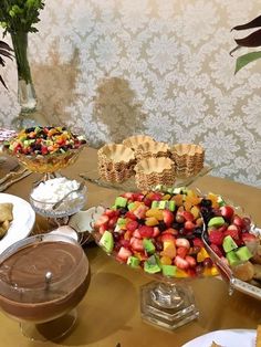 an assortment of desserts and pastries on a table