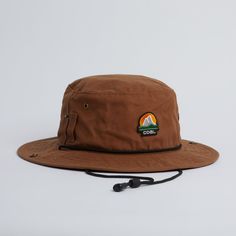 The Seymour Waxed Canvas Boonie Hat at Coal Headwear Adjustable Canvas Sun Hat For Outdoor Use, Casual Wide Brim Bucket Hat For Adventure, Adjustable Wide Brim Bucket Hat For Adventure, Canvas Hat With Curved Brim For Outdoor Activities, Outdoor Canvas Bucket Hat With Short Brim, Brown Camping Hat, Waterproof Brown Hats For Outdoor Activities, Waterproof Brown Hat For Outdoor, Waterproof Brown Hat For Outdoor Activities