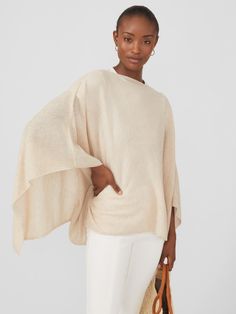 Shrug off that cardigan and cloak yourself in the softest solution for transition dressing. Our whisper-weight poncho drapes flawlessly over a dress or tee, giving you a touch of warmth and a dose of luxury that you can wrap up in all season. | J.McLaughlin Women's Rale Cashmere Poncho Light Heather Oatmeal Mom Wardrobe, Cashmere Poncho, J Mclaughlin, Cashmere Wool, Cloak, Sport Fashion, Ponchos, Traditional Style, Style Guides