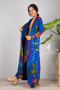 "Blue Tie Dye Cardigan Kimono, Hippie Duster Vest with pockets, Festival Wrap Cape, Beach cover up Produced by NUICHAN PRODUCT SIZE : One Size Fits Most These are the exact measurements from the dress, measured whilst laying flat >> * Chest : 32\" up to 40\" * Shoulder to Shoulder : 14 \" * Sleeve length from shoulder to hem : 21\" * Armhole : 16\" * Length : 48\" ( from shoulder to hem) NOTE : * Model chest : 32\", waist : 24\" hips : 35\" * Combined Height is 5\"6 > I'm 5\"2 (158cm) and I'm we Bohemian V-neck Cardigan For Loungewear, Blue Bohemian V-neck Outerwear, Bohemian Long Sleeve Kimono With Pockets, Hippie Style Long Sleeve Festival Cover-up, Hippie Long Sleeve Festival Cover-up, Oversized Bohemian Cardigan With Pockets, Bohemian Oversized Cardigan With Pockets, Hippie Festival Cover-up With Long Sleeves, Casual Long Sleeve Festival Cover-up