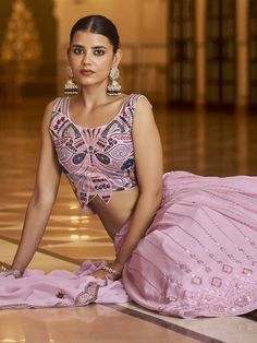 <ul>
<li style="text-align: justify;"><span data-preserver-spaces="true">Pamper yourself in the grandeur and the marvel of a stylish getup with this glamorous dusty pink color full flare georgette material lehenga decorated with all-over sequins lining work and thread embroidered work.</span></li>
<li style="text-align: justify;"><span data-preserver-spaces="true">Paired with similar color georgette material choli made by sleeveless and round shape neck Georgette Material, Model Accessories, Dusty Pink Color, Resham Work, Party Wear Lehenga Choli, Net Lehenga, Pink Lehenga, Party Wear Lehenga, Silk Lehenga