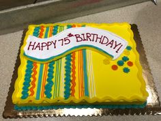 a yellow birthday cake with the words happy 15 th birthday on it's side