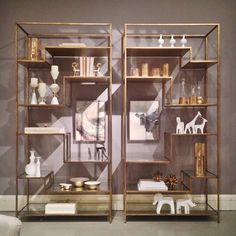 two shelving units with decorative items on them