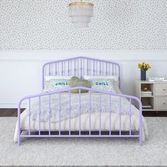 a purple metal bed in a bedroom with white walls and carpeted flooring next to a night stand