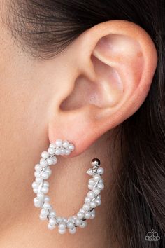 A dainty strand of white pearls is delicately wrapped around a classic silver hoop, creating bubbly refinement. Earring attaches to a standard post fitting. Hoop measures approximately 1 1/2" in diameter.

 Sold as one pair of hoop earrings. White Hoop Earrings, White Pearl Earring, Jewelry Catalog, Pearl Hoop Earrings, Paparazzi Accessories, Classic Gold, Paparazzi Jewelry, White Earrings, Shiny Silver