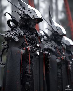 several black and red sculptures are lined up in a row