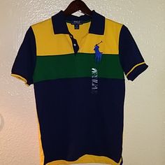 Premium Quality Ralph Lauren Polo Golf Shirt Size 14-16 Youths, And Back Side Of The Shirt Is A Solid Yellow. Fitted Blue Color Block T-shirt, Fitted Blue Color Block Shirt, Fitted Yellow Top With Polo Collar, Blue Color Block Polo Shirt, Sporty Yellow Short Sleeve Polo Shirt, Sporty Yellow Polo Shirt With Short Sleeves, Yellow Cotton Color Block Tops, Yellow Sporty Cotton Polo Shirt, Yellow Cotton Sporty Polo Shirt