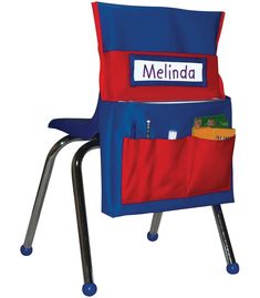 a child's chair with a name and pockets on the back that hold school supplies