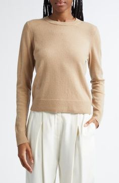 Ultrasoft cashmere yarns give luxurious softness to this classic sweater with ribbed trim. 22" length (size Medium) Crewneck Long sleeves 100% cashmere Dry clean or hand wash, dry flat Imported Neutral Long Sleeve Cashmere Sweater, Beige Cashmere Tops For Fall, Classic Cashmere Sweater In Neutral Color, Brown Cashmere Turtleneck Top, Classic Brown Cashmere Top, Beige Fine Knit Cashmere Sweater, Fitted Cashmere Sweater With Soft Knit, Fitted Soft Knit Cashmere Sweater, Fine Knit Beige Cashmere Sweater