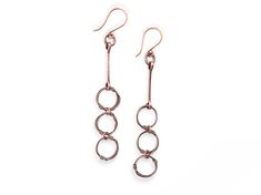 These versatile and ultra-lightweight dangle earrings feature a cascade of three wrapped loops. Flaunt this modern organic look with a minimalist feel to compliment your style and elevate any outfit. Modern Organic, Fringe Necklace, Lariat Necklace, Pendant Bracelet, Organic Modern, Jewel Tones, New Instagram, Your Style, Dangle Earrings