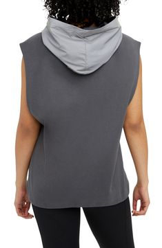 This comfy, sleeveless pullover works as hard as you do—storing your small items in its zip pocket, preventing overheating and showing off your biceps. Fixed hood   Reflective details enhance visibility in low light or at night   61% organic cotton, 39% recycled polyester   Machine wash, line dry   Imported Sleeveless Hoodie, Sleeveless Pullover, Low Light, Small Items, At Night, Zip Pockets, High Neck Dress, Organic Cotton, Cotton Blend