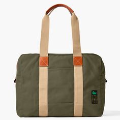 Travel in Style  With this travel-ready look, crafted from 100% Egyptian cotton canvas woven in Italy, you'll be able to pack for days at a time, so get ready to see the world in style. Khaki Canvas Travel Bag, Casual Weekender Bag With Waxed Finish For Travel, Casual Waxed Finish Weekender Bag For Travel, Casual Khaki Canvas Travel Bag, Casual Canvas Travel Bag For Weekend Trips, Cotton Travel Bag With Canvas Lining For Weekend Trips, Casual Travel Accessories With Pockets For Weekend Trips, Cotton Travel Bag With Canvas Lining For Overnight Trips, Casual Weekender Bag With Leather Trim For Travel