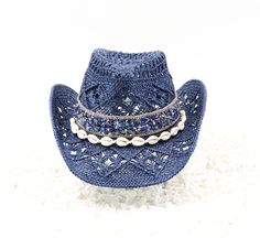 Deep Blue Sea - Natural Navy Cowboy Hat - Stones of Dark Blue & Rhinestones with Shell Band - Beach Ocean Tones - Sturdy Box This is a comfortable cowboy hat to wear to the beach, concerts or rodeo. It's always ready to keep you shaded. Material: Durable natural woven straw Hat Size: US Hat Size 7 1/4 - 7 1/2 Hat Crown: 12cm Hat Brim: 8cm Color: Black Size fits up to 23.5 inches 58cm-60cm Free Hat Retainer with each Hat Order Blue Western Hat For Vacation, Adjustable Blue Hat With Rhinestones, Blue Adjustable Hat With Rhinestones, Blue Rhinestone Hat For Summer, Blue Summer Hat With Rhinestones, Blue Bohemian Beaded Hat, Bohemian Blue Beaded Hat, Blue Bohemian Hat For Gift, Adjustable Blue Beaded Hat